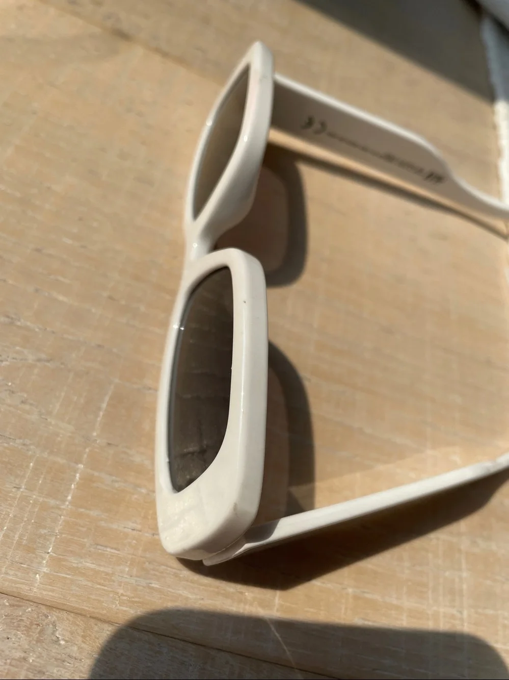 White framed sun glasses. Unisex